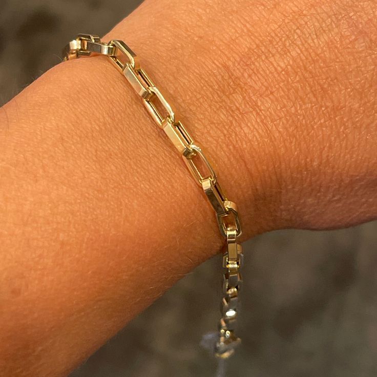 This anchor bracelet boasts a modern style suitable for both men and women. Versatile and elegant, it can be worn alone or layered with other bracelets. Available in 14k yellow gold (3.9g) Length is 7" Width is 4.5mm Lobster clasp Gift wrap available Luxury Tarnish-resistant Bracelets With Rectangular Links, Gold Bracelet With Rectangular Links For Everyday Luxury, Modern White Gold Bracelet, Tarnish Resistant, Modern White Gold Bracelet Tarnish Resistant, Modern White Gold Tarnish-resistant Bracelet, Modern Gold Bracelets With Box Chain, Gold Box Chain Bracelet Modern Style, Modern Everyday Gold Bracelet With Box Chain, Modern Gold Box Chain Bracelet