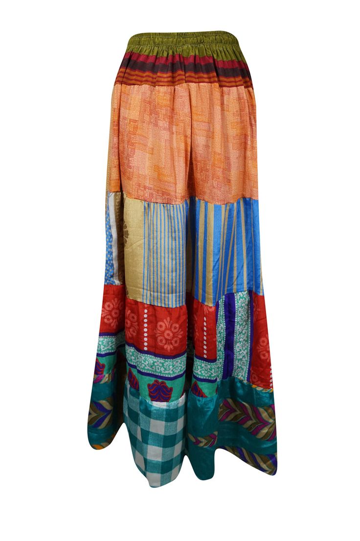 Infuse your wardrobe with seasonal charm with this stunning flared maxi skirt! Expertly crafted from upcycled saree fabric, it boasts vibrant shades of Red, Multi, and an eye-catching array of patterns, making each piece truly one-of-a-kind. The ankle-length design and adjustable drawstring waist ensure a comfortable, flattering fit, perfect for casual strolls at the farmer's market or dancing under the stars at beachside gatherings. Handmade with a focus on sustainability, this boho-chic skirt Beach Cover Up Skirts, Boho Chic Skirts, Yoga Mala Beads, Dancing Under The Stars, Flare Maxi Skirt, Chic Skirt, Yoga Mala, Womens Maxi Skirts, Coverup Skirt