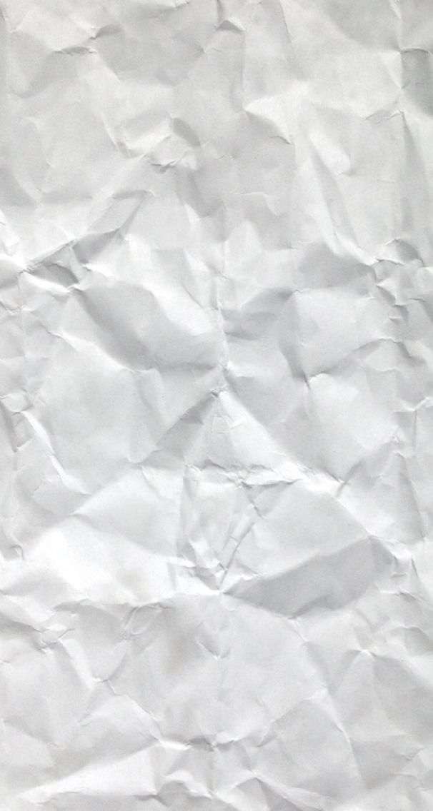 a piece of white paper that is very wrinkled