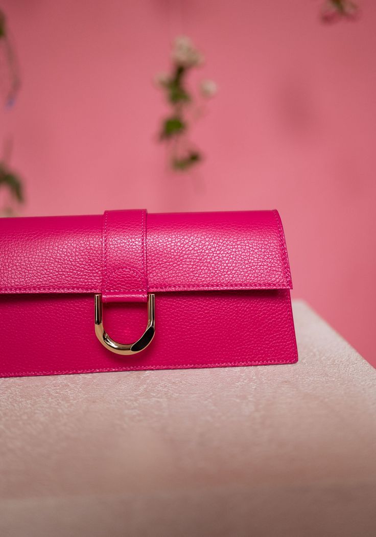 Gorgeous hot pink rectangular bag with a golden buckle and comes with two straps, one short and one long. Perfect for any occasion. Colors: pink - green Length 11.03 in - Width 1.97 in Contexture: genuine leather Classic Pink Rectangular Bag, Pink Rectangular Box Bag For Daily Use, Classic Pink Flap Bag With Detachable Strap, Rectangular Shopping Bag With Gold-tone Hardware, Luxury Pink Bags With Hasp Closure, Classic Pink Rectangular Shoulder Bag, Pink Rectangular Satchel With Adjustable Strap, Rectangular Pink Satchel With Adjustable Strap, Rectangular Flap Bag With Fold Over Clasp For Travel