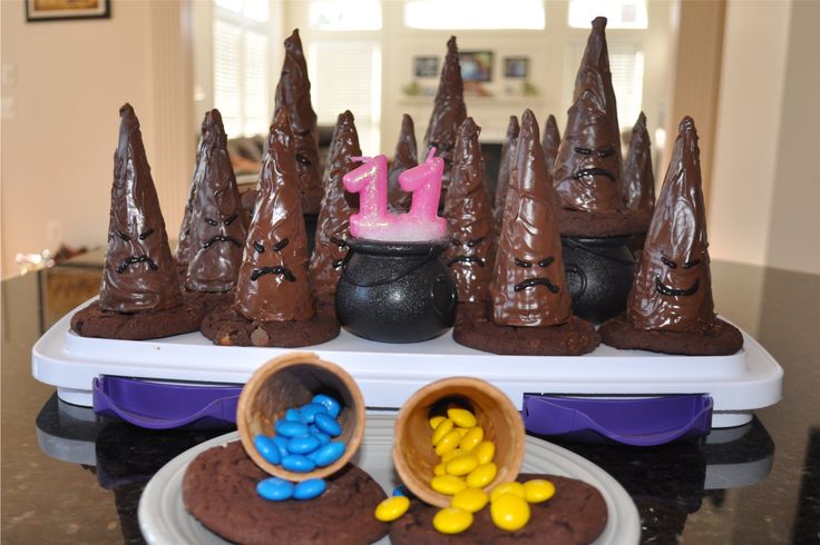 a table topped with chocolate cones and candy