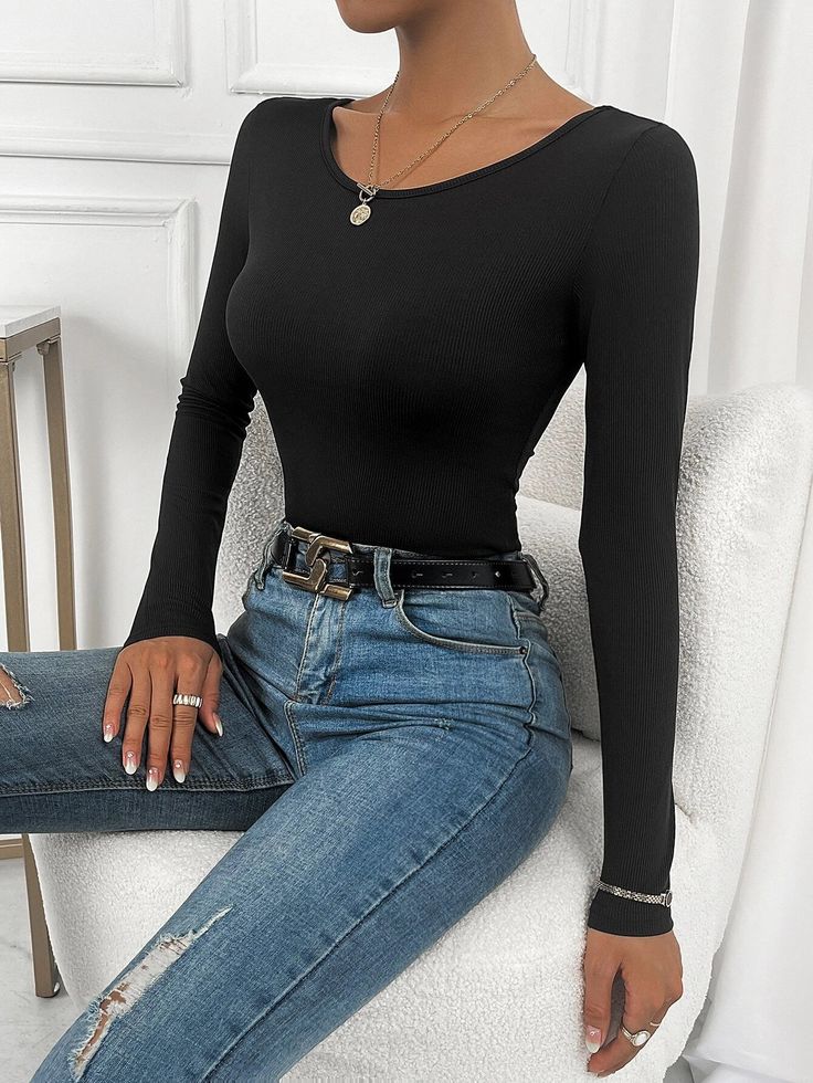 We're sure you'll love this Lace Up Back Rib-knit Bodysuit! Available in a stunning black color, this bodysuit features a scoop neck and long sleeves for an alluring look. The rib-knit fabric is medium stretch with a slim fit, while the eye-catching lace up back details add extra style to your look. Whether you dress it up or down, this versatile bodysuit will always be ready to wow. We just know that you'll feel fantastic wearing it - so don't wait any longer and get yours today! Features: Colo Black Long Sleeve Ribbed Bodysuit, Comfy Jumpsuits, Ribbed Knit Bodysuit, Knit Bodysuit, Ribbed Bodysuit, Black Pattern, Black Long Sleeve, Rib Knit, Black Color