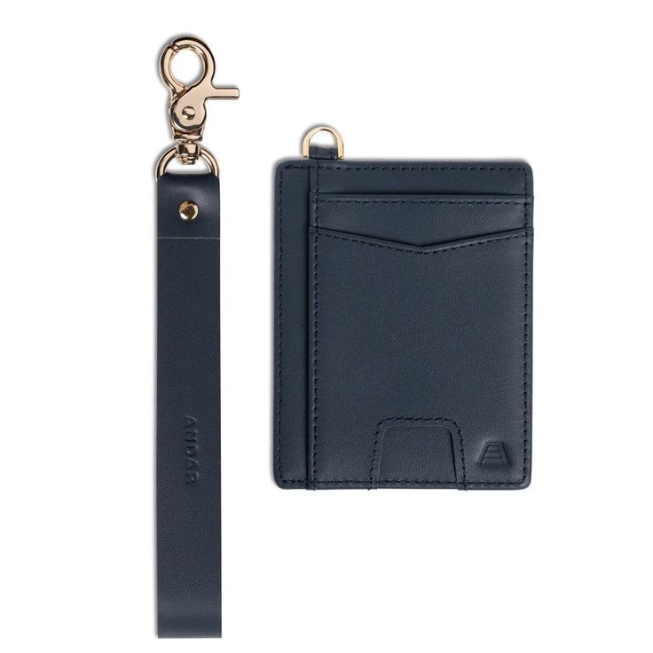 a card case with a keychain attached to it and an empty wallet on the other side