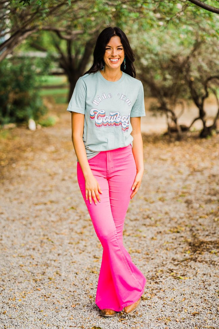 High waisted Super stretch bell bottoms Neon / Hot Pink Model is wearing a size S Neon Cowgirl, Nfr Outfits, Nfr Style, Nfr Fashion, Western Graphic Tees, Baby Shower Outfit, Flared Trousers, Pink Jeans, Church Outfits