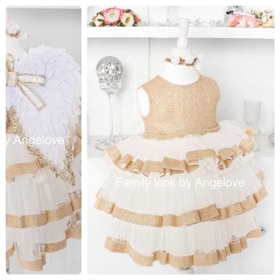 The magnificent dress for the baby is perfect for celebrating your first birthday. Golden Lurex shines very beautifully, the photo does not convey.A shiny top with a very full skirt in three tiers. Each tier is decorated with shiny ribbon.As a supplement to the dress separately, you can purchase felt wings decorated with glitter. Looks very cool.Dress Length Below Knee.High Quality Guarantee - 100% Handmade Just for You and Your Baby!All dresses are Made to order！All Dress Pictures are 100% Real Birthday Tutu Dress, 1st Birthday Tutu, Birthday Photo Shoot, Birthday Angel, Mother Daughter Dress, Dresses Princess, Mommy And Me Outfits, Birthday Tutu, Blush Dresses