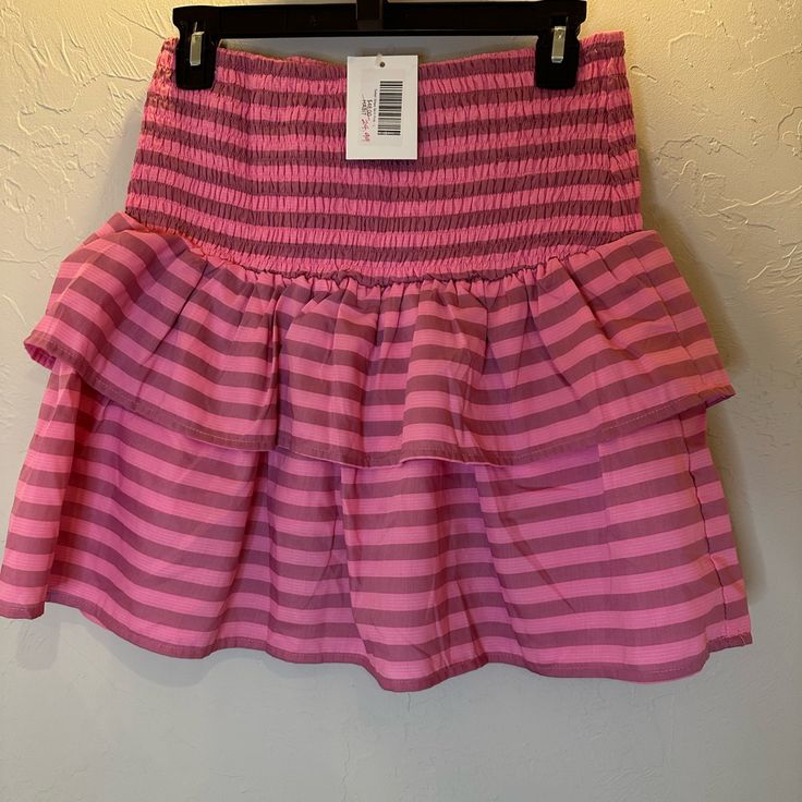 Striped Skirt New With Tags Size Large Striped Mini Skort For Spring, Spring Striped Mini Skort, Spring Striped Tiered Skirt, Striped Mini Skirt For Spring, Spring Striped Mini Skirt, Casual Striped Bottoms With Ruffles, Short Striped Skirt For Spring, Pink Mini Skirt For Spring, Spring Striped Skirted Bottoms