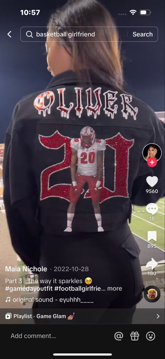 the back of a woman's jacket with an image of a football player on it