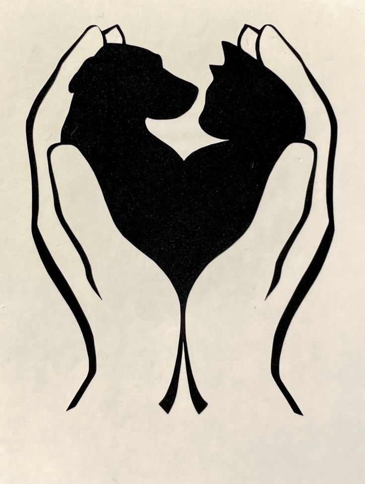 a drawing of two cats in the shape of a heart