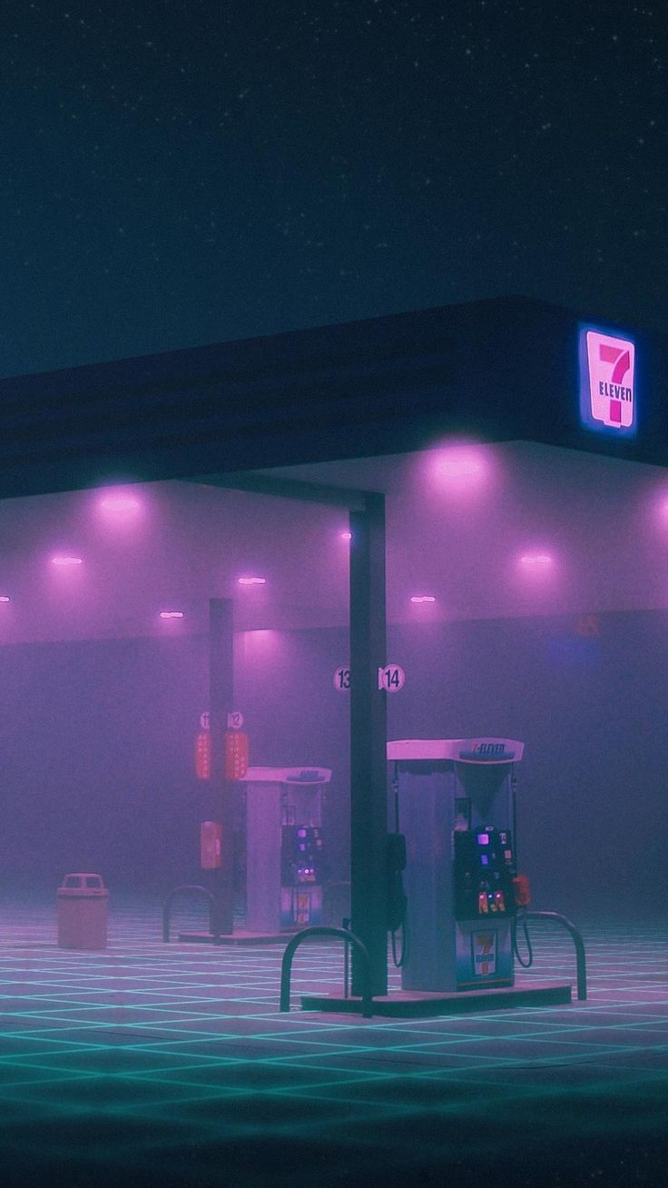 an empty gas station at night with fog