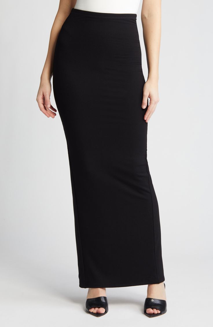 Keep your look captivating in a second-skin skirt with a soaring, high waistband that creates a shapely, sultry appearance. Pull-on style 87% rayon, 13% spandex Hand wash, dry flat Imported Sleek Long Skirt For Night Out, Sleek Maxi Skirt For Night Out, Sleek Long Pencil Skirt For Night Out, Black Stretch Elastane Maxi Skirt, Sleek Elastane Pencil Skirt, Sleek Relaxed Skirt For Night Out, Sleek Full-length Skirt For Night Out, Sleek Full Length Skirt For Night Out, Sleek Fitted Elastane Skirt