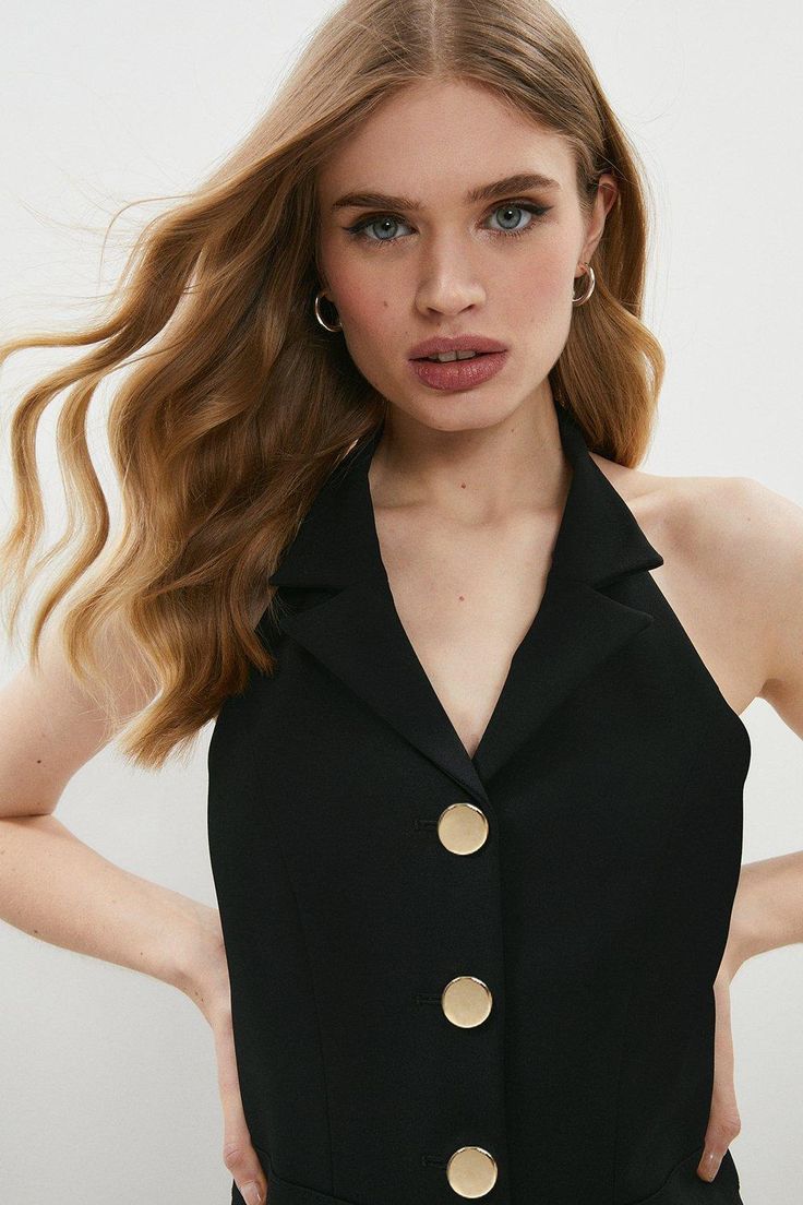 Style: JumpsuitFabric: CrepeNeckline: V NeckSleeve Length: Sleeveless Black Halter Jumpsuit, Tailored Jumpsuit, Halter Jumpsuit, Jumpsuit Black, Summer Weddings, Halter Neckline, Gold Buttons, Wide Leg Trousers, Summer Wedding