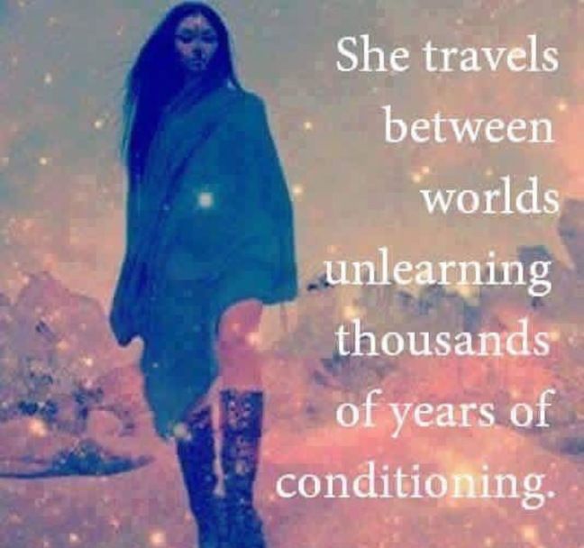 a woman with long hair and boots standing in front of snow covered mountains, text reads she travels between world's unlearning thousands of years of conditioning