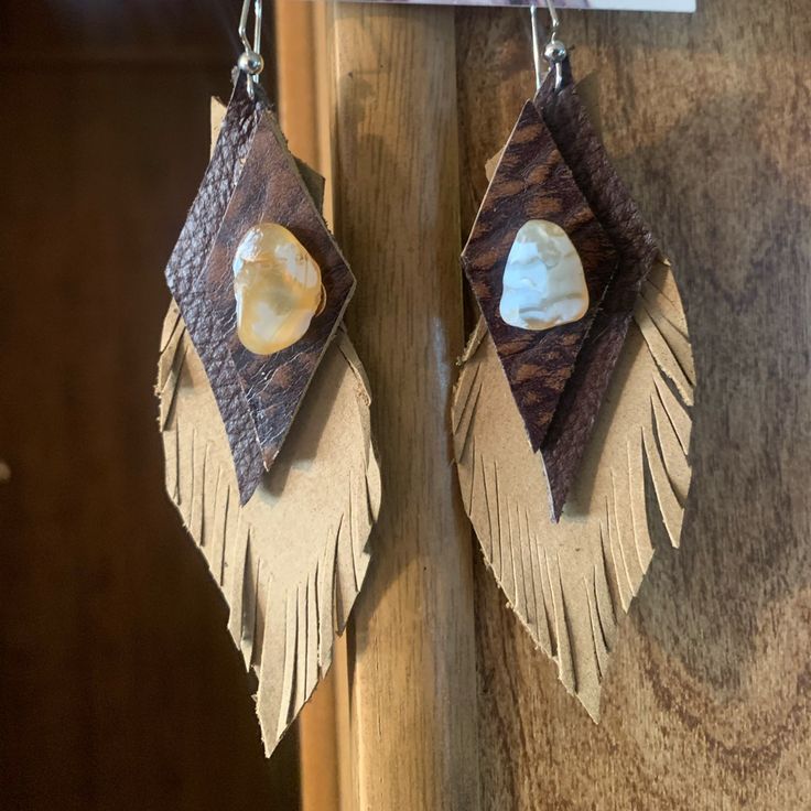 Gorg! Brand New Handmade One Of A Kind Beauties - These Give Me Tribal Vibes! Love The Semi Precious Agate Stones That Shine When In The Sunlight Genuine Leather Amazing 70s 80s Bohemian Hand-tooled Leather Earrings, Brown Hand Tooled Earrings For Festival, Hand-tooled Brown Earrings For Festival, Beige Leather Jewelry, Elegant Leather Jewelry For Festivals, Elegant Brown Leather Jewelry, Elegant Hand-tooled Brown Jewelry, Handmade Rustic Leather Earrings, Elegant Hand Tooled Brown Jewelry