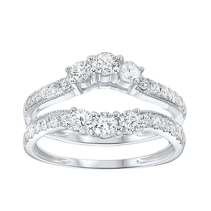 three stone diamond ring set in white gold