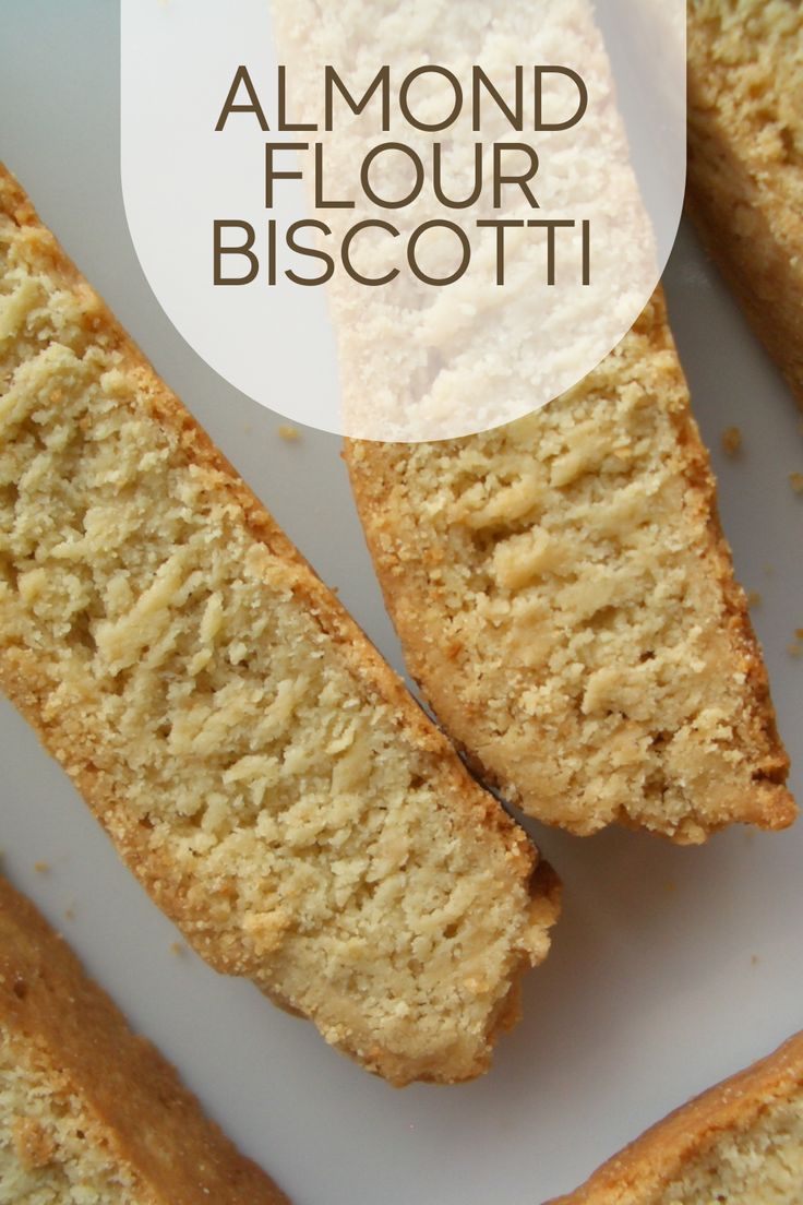 some pieces of biscotti sitting on top of a white plate with the words almond flour biscotti