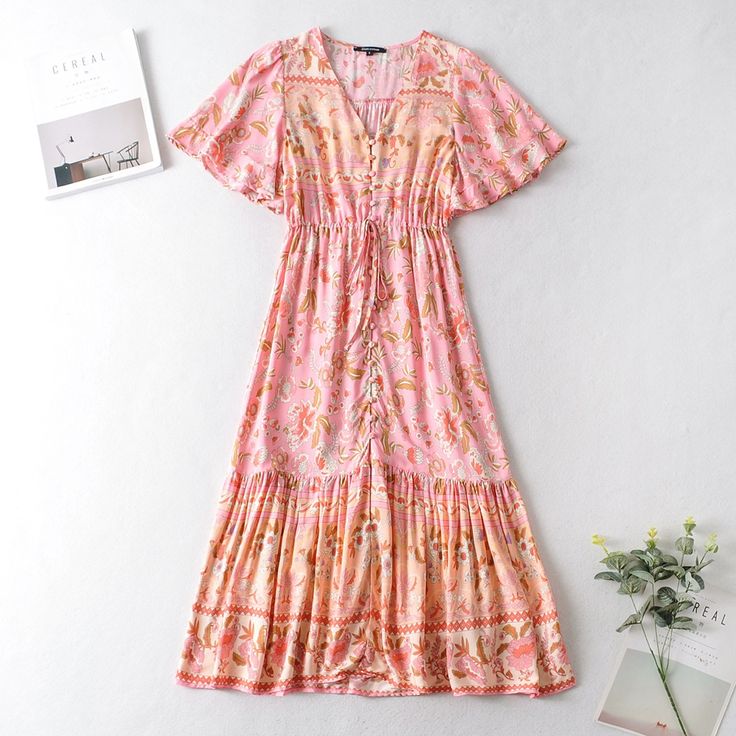 The Most Gorgeous, Vibrant Boho Chic Dress With Amazing Detail. 100% Cotton, This Dress Is A Summer Fall Capsule Piece, Elevating Your Look Instantly. 100% Cotton Material Measurements Small: Shoulder - 36cm Sleeve - 26cm Bust - 92cm Length - 109cm Medium: Shoulder - 37cm Sleeve - 27cm Bust - 96cm Length - 110cm Large: Shoulder - 38cm Sleeve - 28cm Bust - 100cm Length - 111cm Pink V-neck Maxi Dress With Ruffles, Flowy Pink Midi Dress With Ruffle Hem, Pink Flowy Midi Dress With Ruffle Hem, Pink Maxi Dress With Ruffle Hem For Vacation, Feminine Pink Maxi Dress With Ruffle Hem, Casual Pink Maxi Dress With Ruffle Hem, Pink Ruffle Hem Midi Dress For Summer, Pink Summer Midi Dress With Ruffle Hem, Pink Short Sleeve Midi Dress With Ruffle Hem