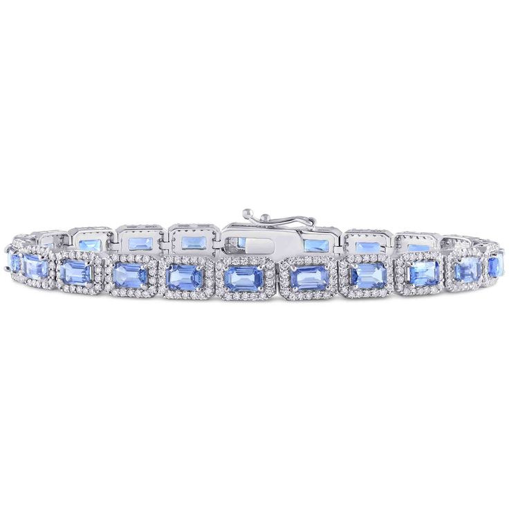 Something blue for every bride or a bracelet to wear on any occasion. This spectacular piece features emerald cut natural light blue sapphires complimented by round cut natural diamonds. 
  This order may have a longer than usual processing time.   MAIN GEMS 
 Natural Sapphires 
 ACCENT GEMS 
 Diamonds 
  ADDITIONAL INFORMATION  Metal: 14K White gold 
 Size: 7" 
Style #: BRC112 Blue Diamond Accented Tennis Bracelet For Wedding, Blue Tennis Bracelet With Diamond Accents For Wedding, Blue Diamond Bracelet For Wedding, Blue Bracelets With Diamond Accents In Fine Jewelry Style, Blue Diamond Bracelet With Diamond Accents, Hand Set Blue Diamond Bracelet, Blue Diamond Bracelet For Wedding With Accents, Sapphire Diamond Bracelet For Wedding, Blue Baguette Diamond Jewelry For Wedding