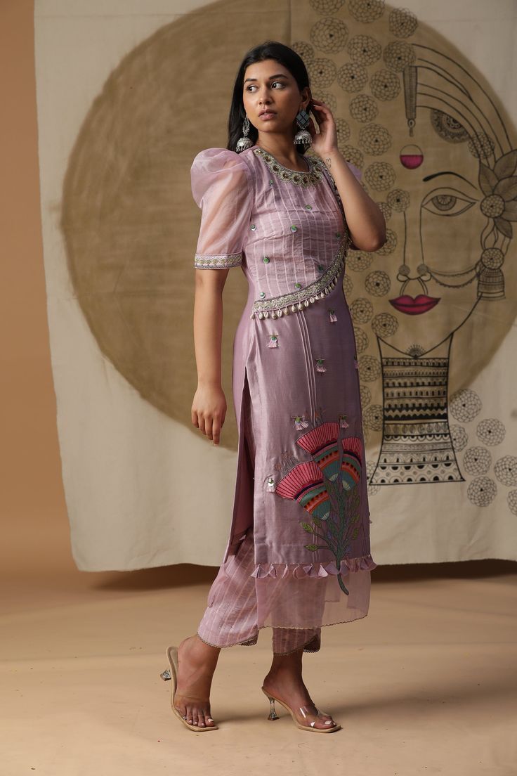 Featuring our lilac handpainted suit set with puff sleeves and handpainted flowers on kurta. Comes with ankle length pants and a dupatta. Fabric : CHANDERI SILK LILAC Color FIT FITTED Lining Material crepe 15 DAYS Delivery 3 Components Maharani Designer Boutique, Boutique Suits, Draping Fashion, Choli Designs, Indian Dresses Traditional, Kurta Designs Women, Designer Boutique, Stylish Party Dresses, Party Wear Indian Dresses