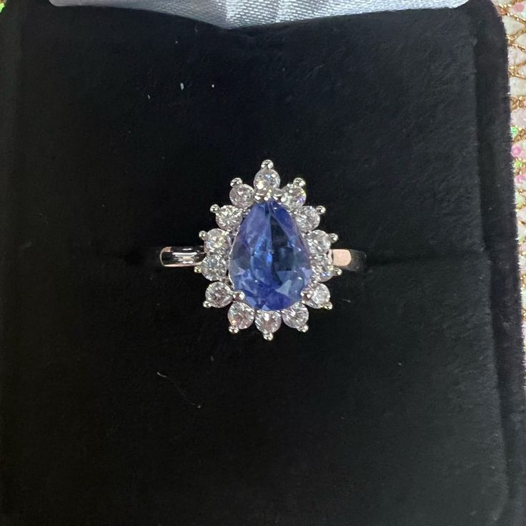 Tanzanite And Cz Ring Size 7 I Believe Great Condition Elegant Sapphire Crystal Diamond Ring, Elegant Sapphire Crystal Ring With Diamond, Formal Sapphire Crystal Ring With Center Stone, Elegant Sapphire Crystal Ring For Formal Occasions, Sapphire Crystal Diamond Ring For Formal Occasions, Classic Sapphire Crystal Ring For Formal Occasions, Formal Sapphire Crystal Ring With Diamond, Formal White Gold Sapphire Crystal Ring, Classic Formal Sapphire Crystal Ring