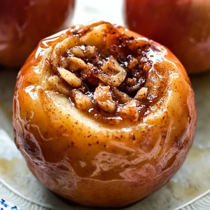 an apple with some kind of pastry on it