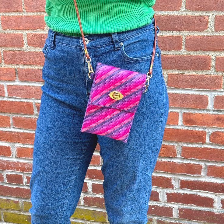 Perfect for when you need a small bag for a day out, meet the Roxanne Crossbody Bag! This bargello cutie is just right for holding your phone and a few essentials, keeping them secure with colorful style. Designed to be wearable from season to season, this bag looks equally great with a summer dress or a jean jacket. It's fun to stitch with clever construction, and chic gold hardware for a truly elevated look. The Roxanne Crossbody comes in two vibrant colorways and each kit includes all the sup Pink Square Phone Bag For Everyday Use, Pink Crossbody Phone Bag For Travel, Pink Square Phone Bag For Daily Use, Pink Phone Bag For Travel, Pink Portable Phone Bag For Travel, Portable Pink Phone Bag For Travel, Pink Phone Shoulder Bag, Trendy Multicolor Phone Bag For Daily Use, Pink Phone Bag With Detachable Strap