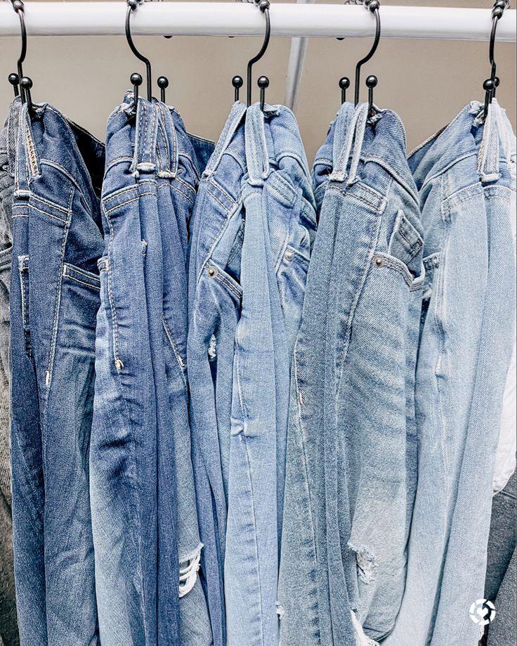 Hang jean belt loops on curtain rod hooks Hanging Jeans On Shower Hooks, Hanging Pants With Shower Hooks, Hang Jeans With S Hook, Hanging Jeans In Closet With Shower Hooks, Hanging Jeans With Shower Hooks, Shower Curtain Hooks For Jeans, Hooks For Jeans In Closet, Hanging Jeans On Hooks, Shower Hooks For Jeans