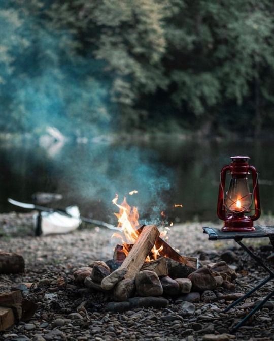 the instagram page shows an image of a campfire