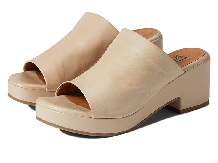 Miz Mooz Gwen - Women's Sandals : Cream : Slip into comfort and style in Miz Mooz Gwen heels. Upper crafted from leather. Leather lining and insole for soft comfort. Open round toe silhouette. Block heels. Easy slip-on style. Man-made outsole. Made in Portugal. Single shoe weighs 10 oz. Measurements: Heel Height: 2 3 4 in Weight: 10 oz Platform Height: 1 in Product measurements were taken using size EU 38 (US Women's 7.5-8), width B - Medium. Please note that measurements may vary by size. Weigh Beige Leather Heels With Cushioned Footbed, Comfortable Leather Heels With Arch Support, Leather Heels With Arch Support And Round Toe, Comfortable Leather Block Heel Heels, Leather Round Toe Heels With Arch Support, Spring Mules With Arch Support And Round Toe, Spring Round Toe Mules With Arch Support, Comfortable Leather Heels With Cushioned Footbed, Comfortable Leather Heels With Ortholite Insole