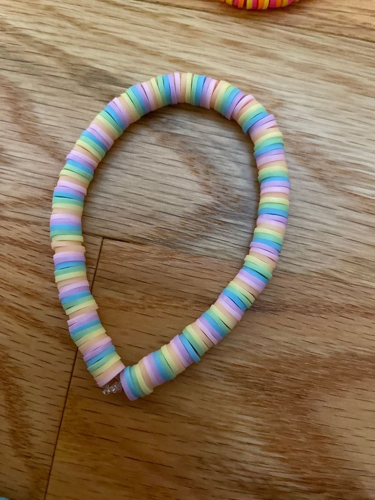 a close up of a bracelet on a table