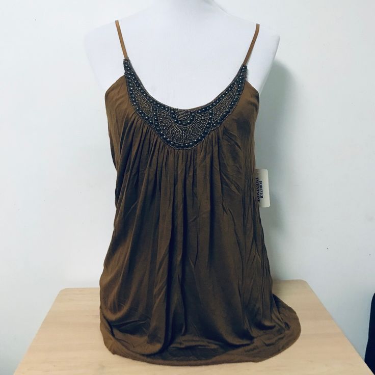 Condition: New With Tag Size: Large Color: Mustard Pit-Pit: 18” Length: 29” Forever 21 Fitted Spaghetti Strap Tank Top, Forever 21 Stretch Tank Top, Fitted Forever 21 Camisole Tank Top, Forever 21 Fitted Camisole Tank Top, Forever 21 Spring V-neck Tank Top, Orange Yellow, Forever 21 Tops, Forever 21, Womens Tops