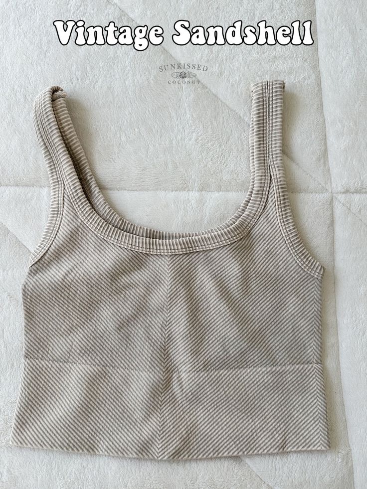 Made in USAFabric: 92% Nylon / 8% SpandexA ribbed knit crop top featuring a scoop necklineand back and vintage wash. Although this product is one size, the material allows it to fit sizes small-XL. Nervous on if you think this product will fit? Definitely order one and give it a chance! I PROMISE you will fall in love with these tanktops! Fuzzy Pullover, Lounge Sweater, Rainbow Sweater, Waffle Knit Sweater, Yellow Knit, Ribbed Crop Top, Fuzzy Sweater, Vintage Rock, Vintage New York