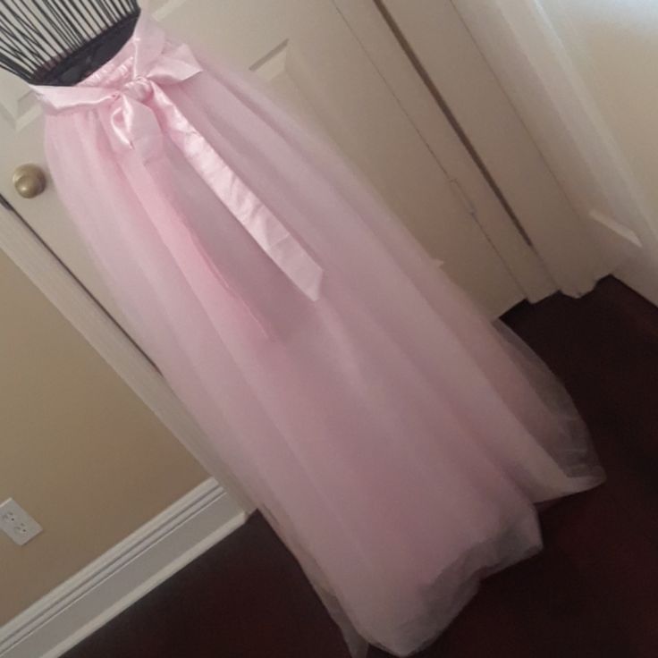 Nwot...Beautiful Soft Cotton Candy Pink Tulle Skirt...Fully Elastic Waist..Satin Ribbon Tie...Size Small..Maxi Length...This Is Very Soft Tulle...Great For Photo Shoots On Beach..Wedding..Etc...Gorgeous Color!!! Brand New Elegant Pink Prom Skirt, Pink Satin Long Skirt, Pink Satin Skirt For Party, Pink Satin Party Skirt, Feminine Lined Skirt For Wedding, Feminine Tulle Skirt For Wedding, Elegant Pink Skirt For Bridesmaids, Spring Wedding Satin Maxi Skirt, Feminine Wedding Skirt With Lining