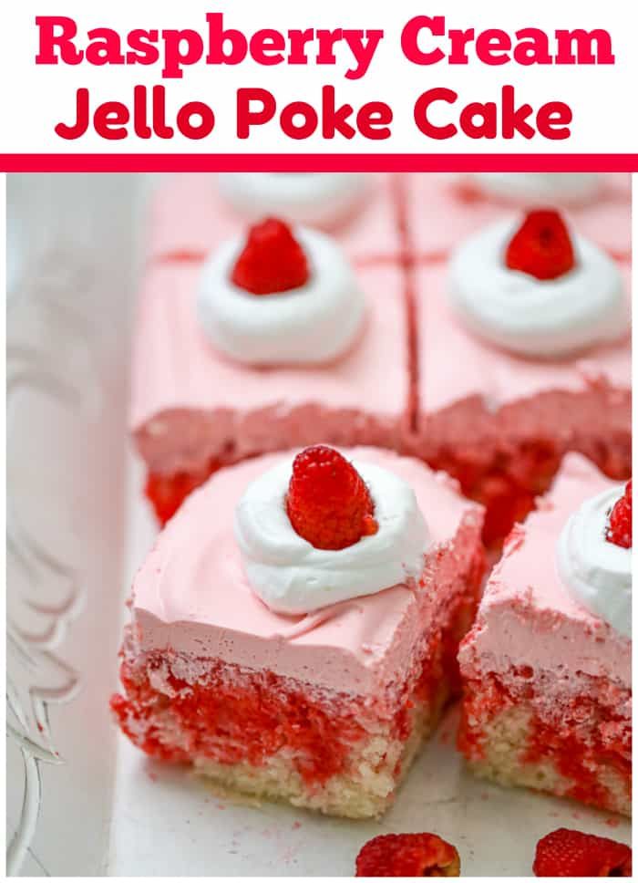 raspberry cream jello poke cake on a plate