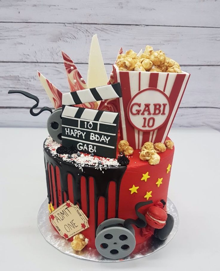 a birthday cake made to look like a movie theme