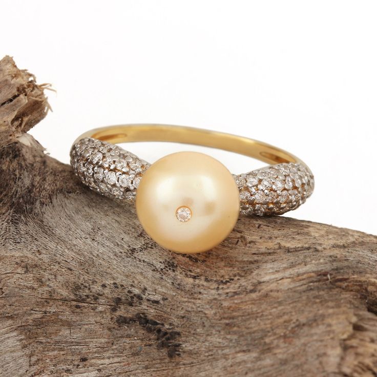 This ring made with natural pearl & diamond in solid 14k yellow gold, Genuine Pave Diamond pearl Floral Ring Solid 14k Yellow Gold Jewelry Pearl Ring, Diamond Ring, Gold Ring, Engagement Ring, Everyday Jewelry Special customize for Anniversary, Birthday Gift, Valentine, Mother's Day Christmas. Item Details: 14k Yellow Gold Weight:- 1.90 Grams Diamond Weight:- 0.35 Carats Pearl Weight:- 3.81 Carats Ring Size 7 ( can be customized) Item SKU: AROS-2019 All the items are available in rose gold, Yellow Gold Stackable Ring, Ear Wrap Earrings, Tiny Diamond Ring, Ring For Wedding, Ring Everyday, Unique Rings Vintage, Gold Rings Stackable, Zierlicher Ring, Gold Statement Ring