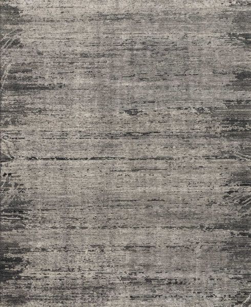 an area rug with grey and black colors