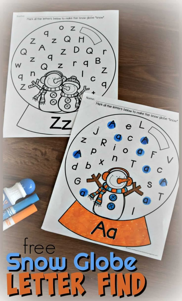 two snow globe letter finders for kids to practice their handwriting and writing skills with