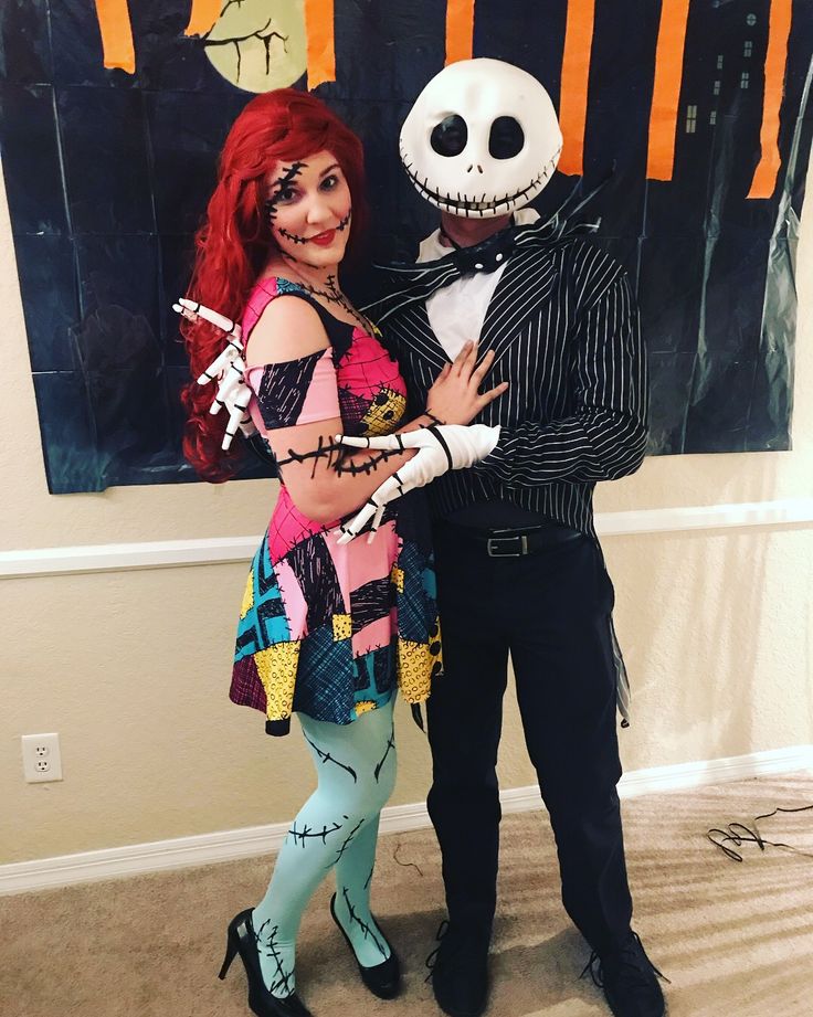 a man and woman dressed up as jack and sally from the nightmare before they were married