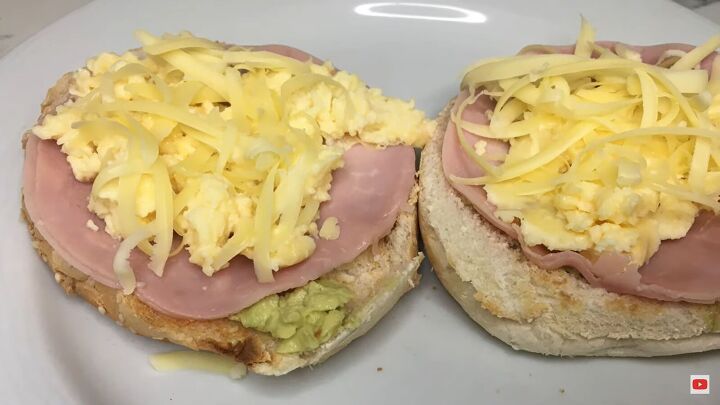 two sandwiches with ham and cheese on them