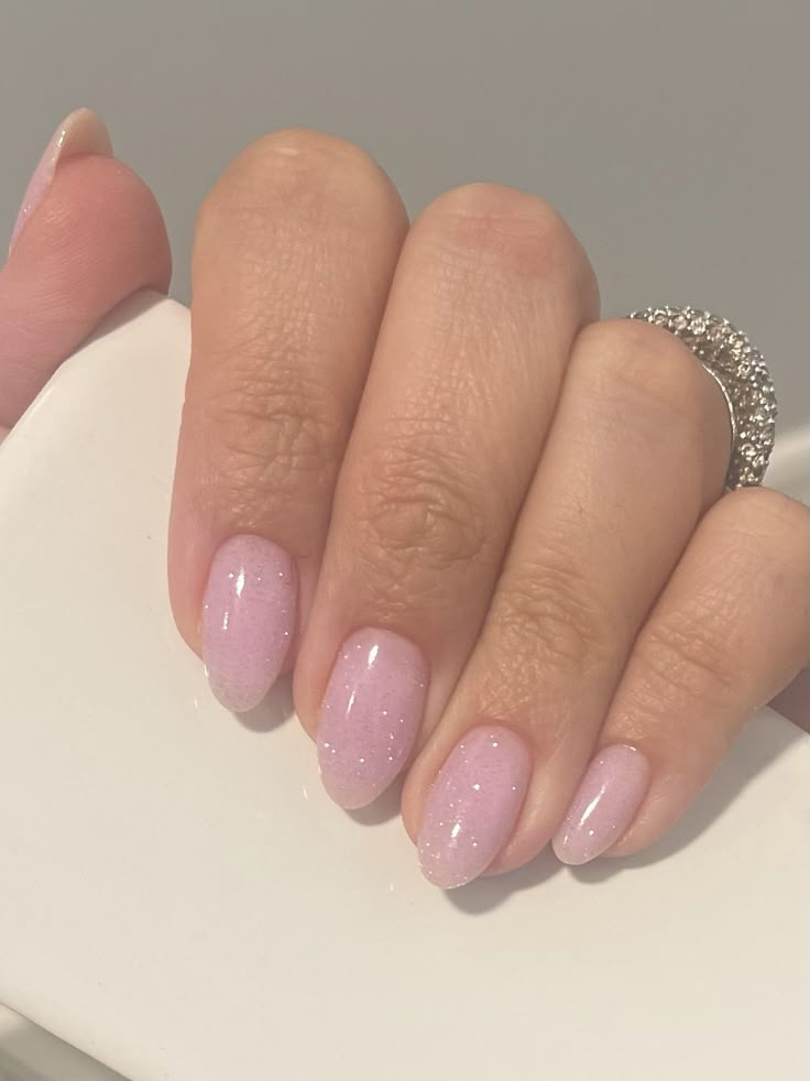 Natural Pink Sparkle Nails, Sparkly Nude Pink Nails, Feminine Pink Nails, 90s Nail Inspiration, Dip Powder Nails Clear, Light Pink Nails With Sparkle, Pink Nails Tan Skin, Pearl Pink Nails Gel, Sparkly Almond Nails Glitter