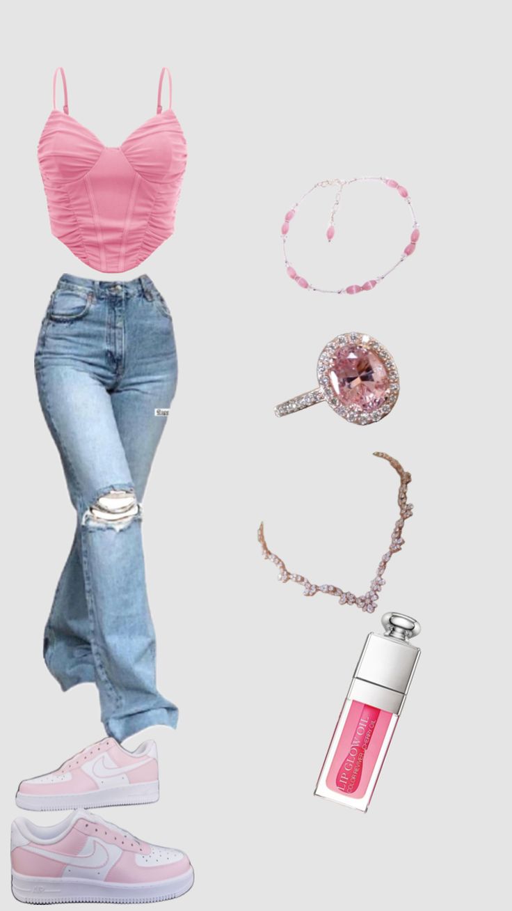 a woman in ripped jeans and pink top standing next to her purse, with other items around her