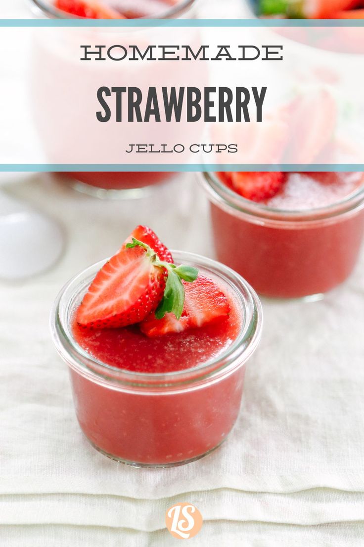 homemade strawberry jello cups with fresh strawberries in the background and text overlay