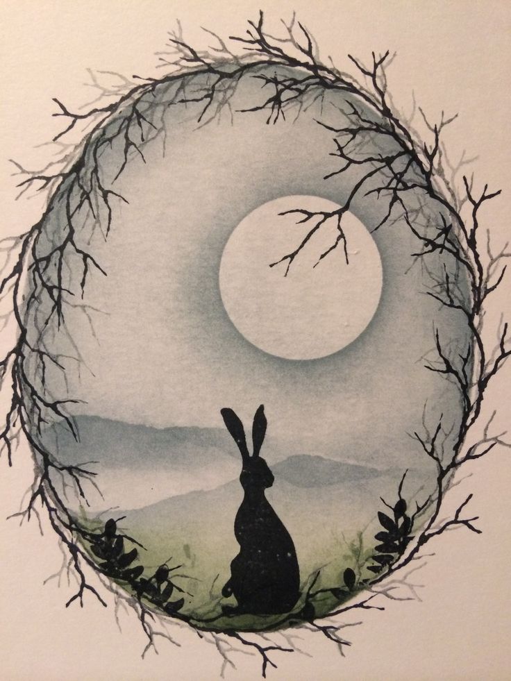 a drawing of a rabbit sitting in the middle of a forest under a full moon