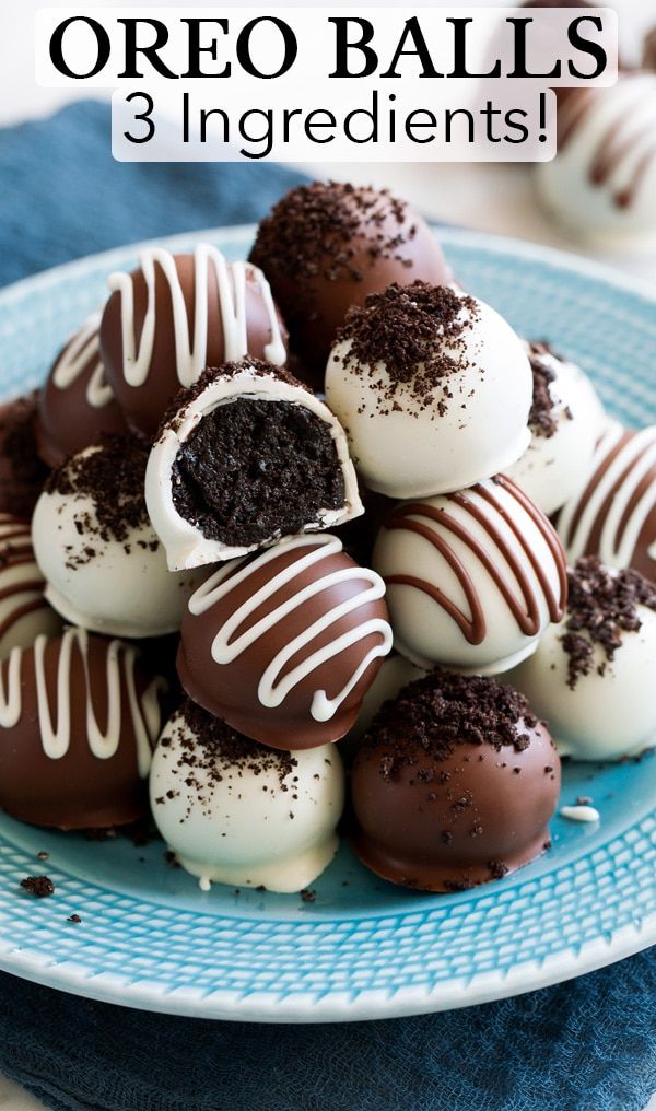 chocolate covered oreo balls on a blue plate