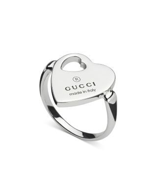 Gucci Sterling Silver Trademark Heart Ring Gucci White Gold Jewelry For Anniversary, Gucci Fine Jewelry White Gold Rings, Gucci White Gold Fine Jewelry Ring, Gucci White Gold Ring In Fine Jewelry Style, Gucci White Gold Jewelry For Gift, Designer Gucci Rings With Polished Finish, White Gold Gucci Jewelry For Gift, Gucci Fine Jewelry Ring For Anniversary, Luxury Hallmarked Gucci Rings