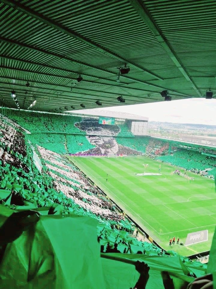 an empty soccer stadium filled with fans