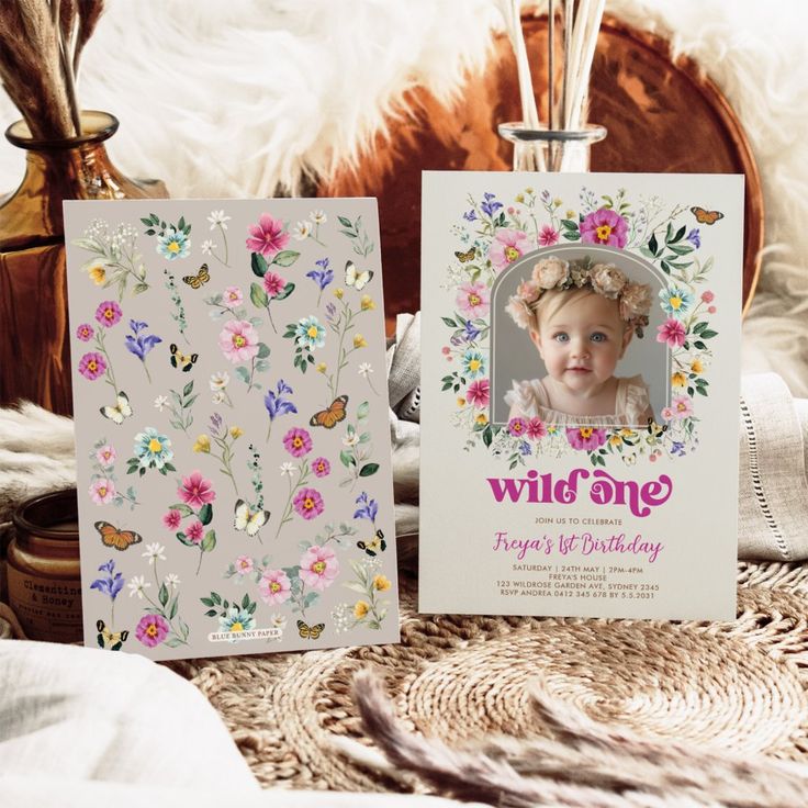 two cards with flowers and butterflies on them, one is for a child's first birthday