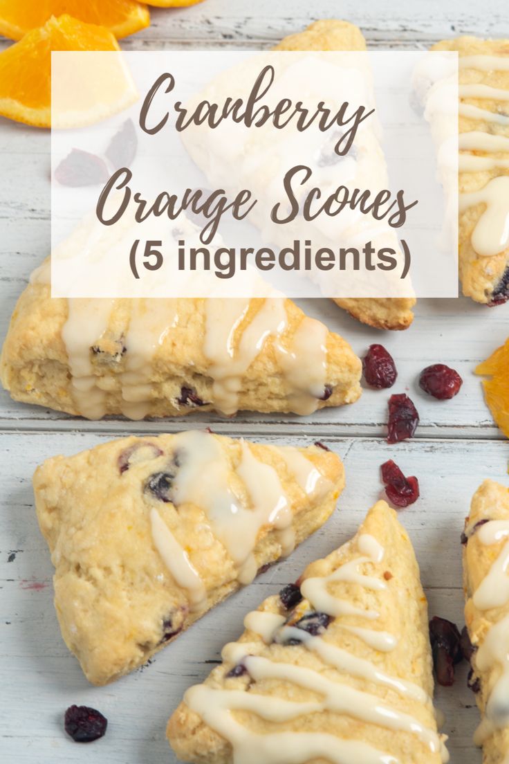 cranberry orange scones with icing and dried cranberries on the side