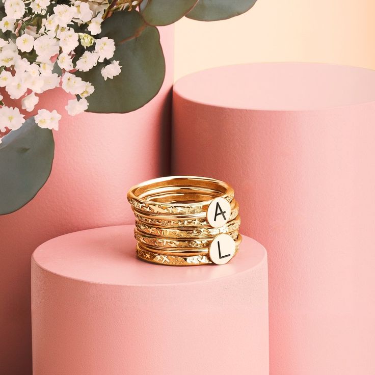 Looking for a unique and special gift? Or maybe you're just treating yourself? Either way, our Initial Stacking Rings Set of 7 in Gold, Silver, or Rose Gold is sure to fit the bill! Personalize these gorgeous rings with any uppercase letter in an arial-style font, making them perfect for representing yourself or your loved ones. The set comes with two initial rings and five heavy weight "Raw Silk" stackers, all in your choice of Sterling Silver, 14K Yellow Gold Fill, or 14K Rose Gold Fill. Stack Initial Rings, Tarnish Remover, Gorgeous Rings, Stacking Ring Set, Gold Filled Ring, Initial Ring, Disc Necklace, Rings Set, Raw Silk