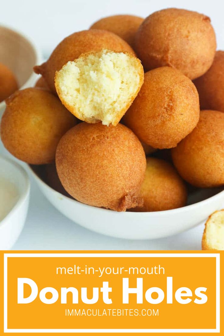 a bowl full of doughnut holes with the words melt - in - your - mouth donut holes